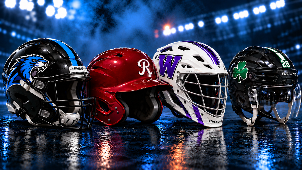 Custom football helmets with team decals in a stadium
